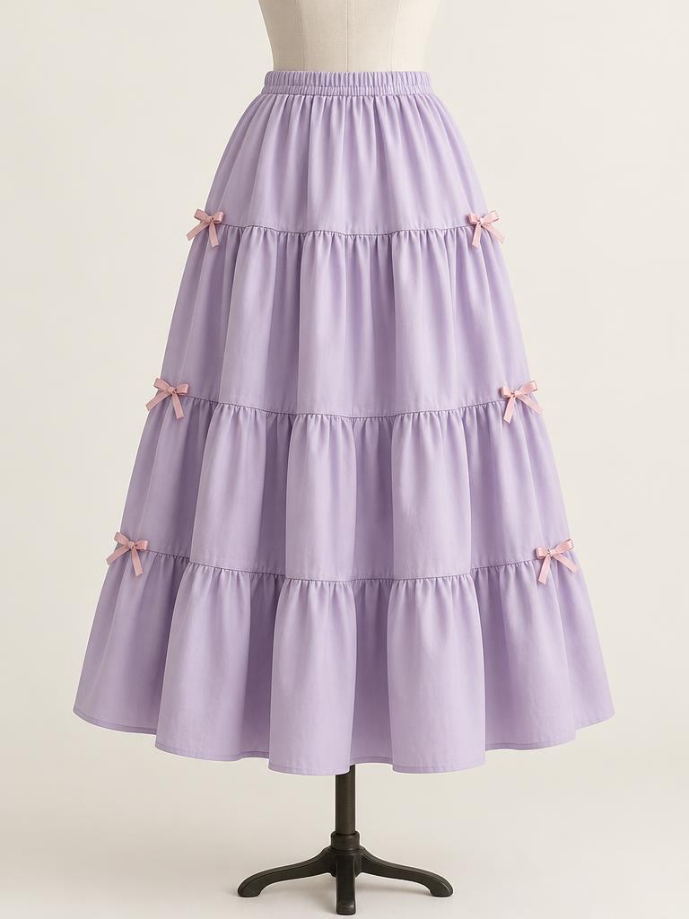 Four gathered tiers, an elastic waist and optional ribbon bows.